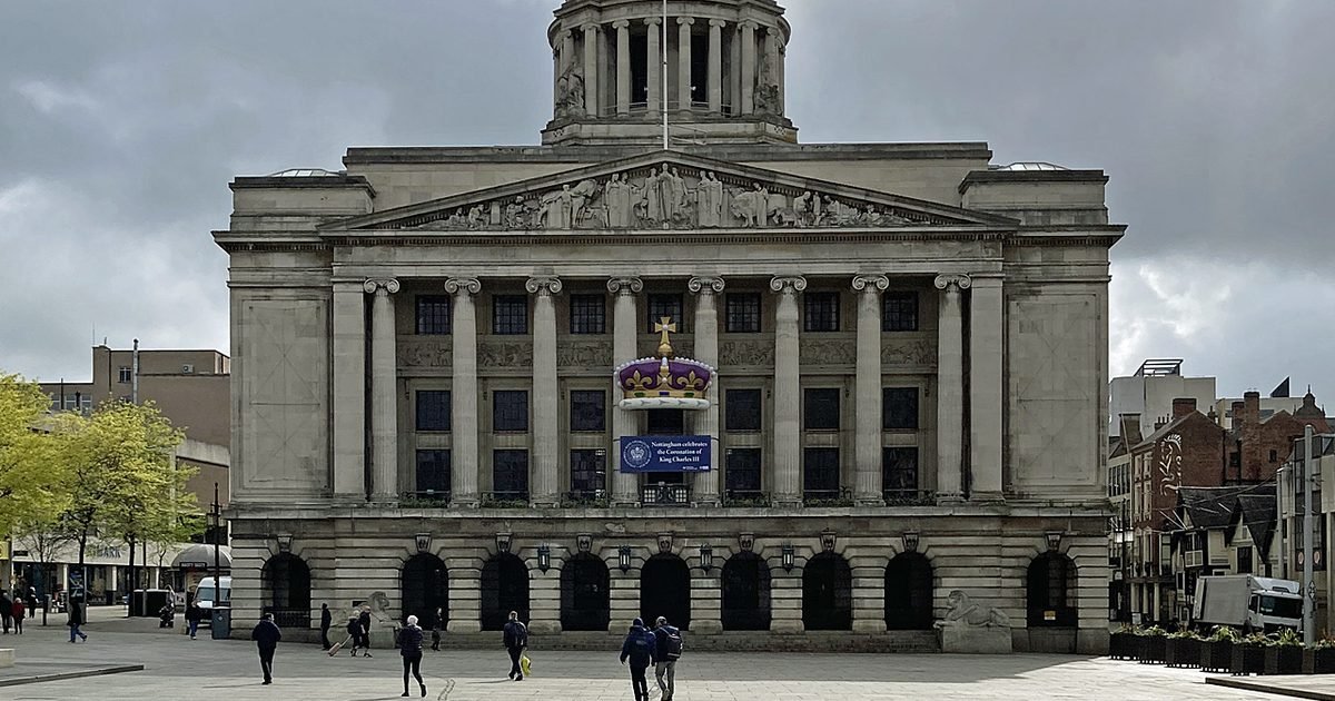 Nottingham Old Market Square with the Council House dome and tram in the foreground